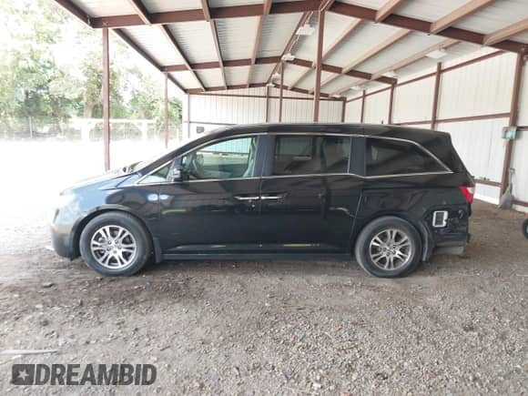 2013 Honda Odyssey EX-L с VIN 5FNRL5H64DB089566, выставлен на аукционе IAAI как лот 43146642 с пробегом 233 467 миль миль и . История ставок и продаж доступна на DreamBid. Изображение 15.