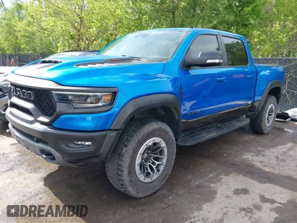 2021 Ram 1500 TRX with VIN 1C6SRFU94MN812802, listed as a IAAI auction lot 42137737 with 43,794 mi miles and . Bid and sale history available at DreamBid. Image 19.