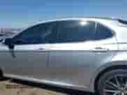 2021 Toyota Camry Hybrid XLE with VIN 4T1F31AK2MU547062, listed as a IAAI auction lot 42405027 with 170,899 mi miles and . Bid and sale history available at DreamBid. Image 14.