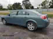 2009 Saturn Aura XE with VIN 1G8ZS57B69F114871, listed as a Copart auction lot 81763035 with 107,658 mi miles and Salvage title. Bid and sale history available at DreamBid. Image 2.