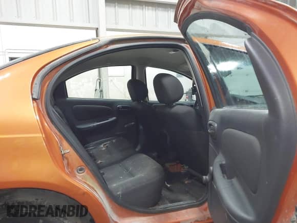 2005 Dodge Neon SXT with VIN 1B3ES56C35D120763, listed as a IAAI auction lot 42083309 with 217,612 mi miles and . Bid and sale history available at DreamBid. Image 8.