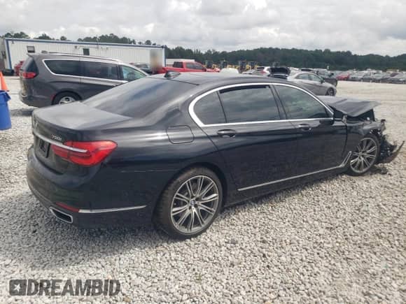 2018 BMW 7 Series 750i with VIN WBA7F0C59JGM23038, listed as a Copart auction lot 68652255 with Not provided miles and Salvage title. Bid and sale history available at DreamBid. Image 3.