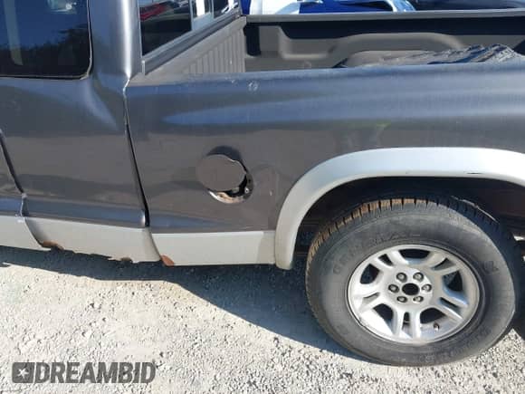 2002 Dodge Dakota SLT with VIN 1B7GL42X92S512287, listed as a IAAI auction lot 43082241 with 151,099 mi miles and . Bid and sale history available at DreamBid. Image 18.