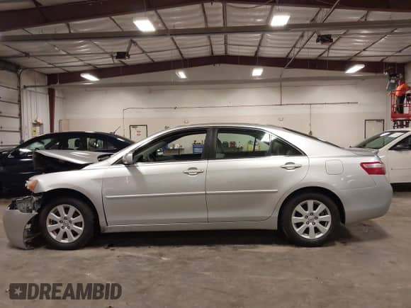 2009 Toyota Camry z VIN 4T4BE46K09R133567, wystawiony jako IAAI lot #42984886 z przebiegiem 152 037 mil mil oraz . Historia ofert i sprzedaży dostępna na DreamBid. Obrazek 14.