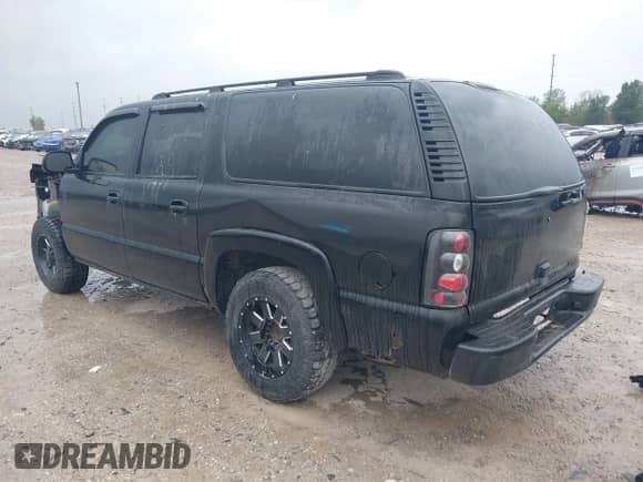 2002 Chevrolet Suburban LT z VIN 1GNFK16Z22J197483, wystawiony jako IAAI lot #43136045 z przebiegiem 242 654 mil mil oraz . Historia ofert i sprzedaży dostępna na DreamBid. Obrazek 3.