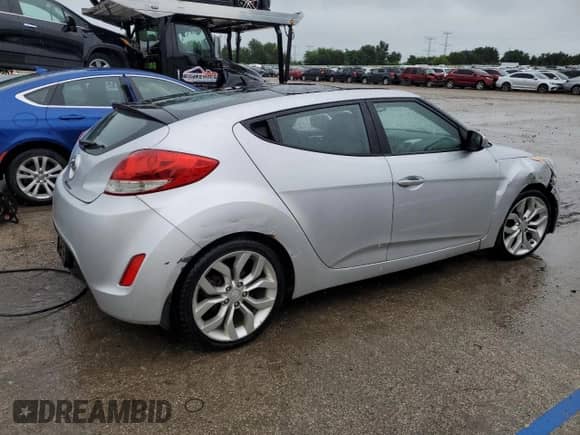 2012 Hyundai Veloster w/Red Int с VIN KMHTC6ADXCU022959, выставлен на аукционе Copart как лот 65585115 с пробегом Не указан миль и Списание • Salvage title. История ставок и продаж доступна на DreamBid. Изображение 3.