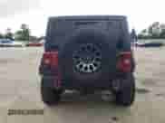 2014 Jeep Wrangler Rubicon with VIN 1C4BJWCG2EL303420, listed as a Copart auction lot 63550985 with 87,175 mi miles and Salvage title. Bid and sale history available at DreamBid. Image 6.