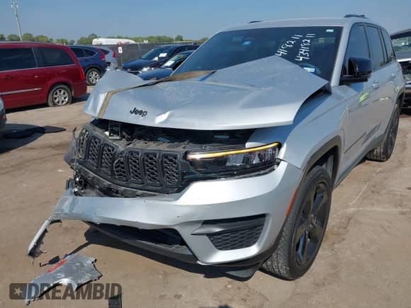 2023 Jeep Grand Cherokee Laredo with VIN 1C4RJHAG5PC659828, listed as a IAAI auction lot 43418211 with 27,942 mi miles and . Bid and sale history available at DreamBid. Image 6.