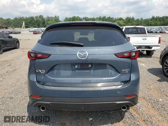 2025 Mazda CX-5 S Carbon Edition с VIN JM3KFBCMXS0655066, выставлен на аукционе Copart как лот 66453165 с пробегом 1 559 миль миль и Списание • Salvage title. История ставок и продаж доступна на DreamBid. Изображение 6.