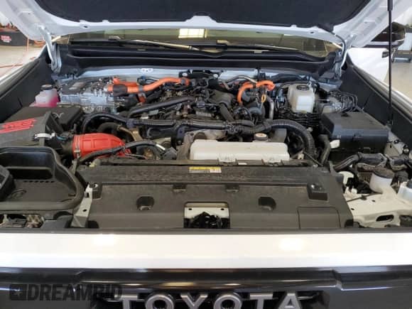 2025 Toyota Tacoma TRD Sport Hybrid z VIN 3TYLC5LN8ST022034, wystawiony jako Copart lot #85674425 z przebiegiem 6 920 mil mil oraz Szkoda całkowita • Salvage title. Historia ofert i sprzedaży dostępna na DreamBid. Obrazek 11.