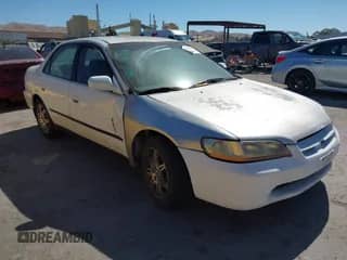 1999 Honda Accord LX with VIN 1HGCG1648XA039370, listed as a IAAI auction lot 42877965 with 260,643 mi miles and . Bid and sale history available at DreamBid. Image 1.