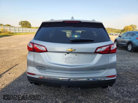 2019 Chevrolet Equinox Premier с VIN 2GNAXYEX9K6218749, выставлен на аукционе Copart как лот 72063305 с пробегом 87 635 миль миль и Списание • Salvage title. История ставок и продаж доступна на DreamBid. Изображение 6.