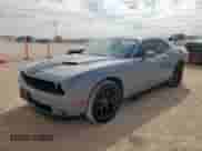 2020 Dodge Challenger SXT with VIN 2C3CDZAG3LH218990, listed as a Copart auction lot 81957265 with 59,129 mi miles and Salvage title. Bid and sale history available at DreamBid. Image 1.
