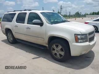 2009 Chevrolet Suburban LTZ z VIN 1GNFK36399R234676, wystawiony jako IAAI lot #42321922 z przebiegiem 419 096 mil mil oraz . Historia ofert i sprzedaży dostępna na DreamBid. Obrazek 1.