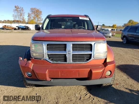 2009 Dodge Nitro SXT с VIN 1D8GU28K99W520973, выставлен на аукционе Copart как лот 77427114 с пробегом 242 803 миль миль и Списание • Salvage title. История ставок и продаж доступна на DreamBid. Изображение 5.