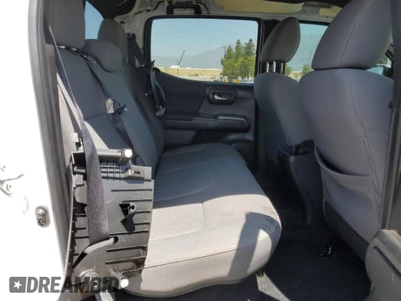 2023 Toyota Tacoma TRD Off Road z VIN 3TMCZ5ANXPM599586, wystawiony jako Copart lot #63530045 z przebiegiem Nie podano mil oraz Szkoda całkowita • Salvage title. Historia ofert i sprzedaży dostępna na DreamBid. Obrazek 10.