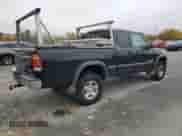 2002 Toyota Tundra SR5 с VIN 5TBBT44162S274967, выставлен на аукционе Copart как лот 90833225 с пробегом 299 190 миль миль и Чистый • Clean title. История ставок и продаж доступна на DreamBid. Изображение 3.