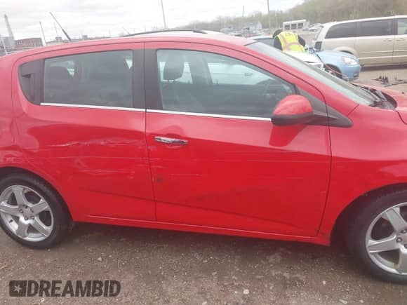 2013 Chevrolet Sonic LTZ with VIN 1G1JE6SH5D4140421, listed as a IAAI auction lot 41996096 with 110,435 mi miles and . Bid and sale history available at DreamBid. Image 13.