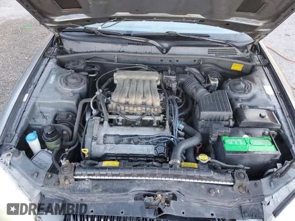 2001 Hyundai Sonata GLS z VIN KMHWF35V21A498000, wystawiony jako Copart lot #47246965 z przebiegiem 111 616 mil mil oraz Szkoda całkowita • Salvage title. Historia ofert i sprzedaży dostępna na DreamBid. Obrazek 11.