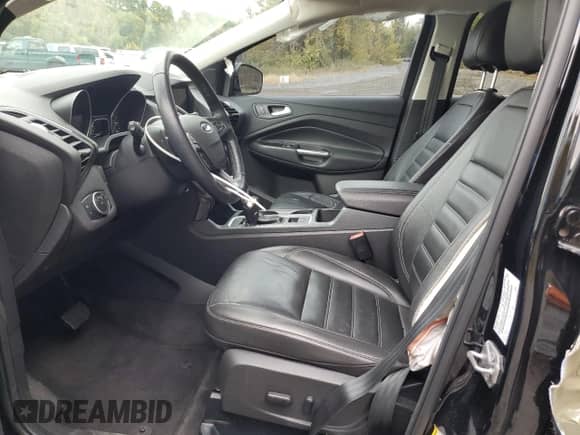 2017 Ford Escape Titanium with VIN 1FMCU0J90HUB64587, listed as a Copart auction lot 86682055 with 64,514 mi miles and Salvage title. Bid and sale history available at DreamBid. Image 7.