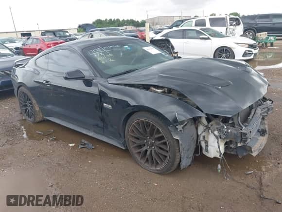 2018 Ford Mustang GT z VIN 1FA6P8CF5J5123212, wystawiony jako IAAI lot #42991896 z przebiegiem 97 579 mil mil oraz . Historia ofert i sprzedaży dostępna na DreamBid. Obrazek 1.