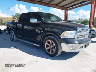 2014 Ram 1500 Laramie with VIN 1C6RR6NT2ES319969, listed as a IAAI auction lot 43512010 with 188,924 mi miles and . Bid and sale history available at DreamBid. Image 1.
