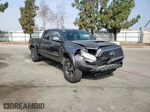 2018 Toyota Tacoma SR5 z VIN 3TMBZ5DN4JM017240, wystawiony jako Copart lot #60284405 z przebiegiem 150 310 mil mil oraz Szkoda całkowita • Salvage title. Historia ofert i sprzedaży dostępna na DreamBid. Obrazek 13.