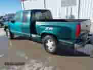 1997 Chevrolet Silverado 1500 with VIN 2GCEK19RXV1115899, listed as a IAAI auction lot 41671682 with 291,289 mi miles and . Bid and sale history available at DreamBid. Image 3.