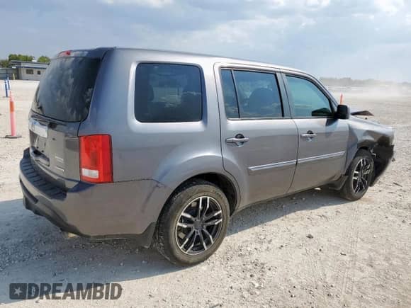 2015 Honda Pilot SE with VIN 5FNYF3H30FB027520, listed as a Copart auction lot 80857235 with 290,883 mi miles and Salvage title. Bid and sale history available at DreamBid. Image 3.