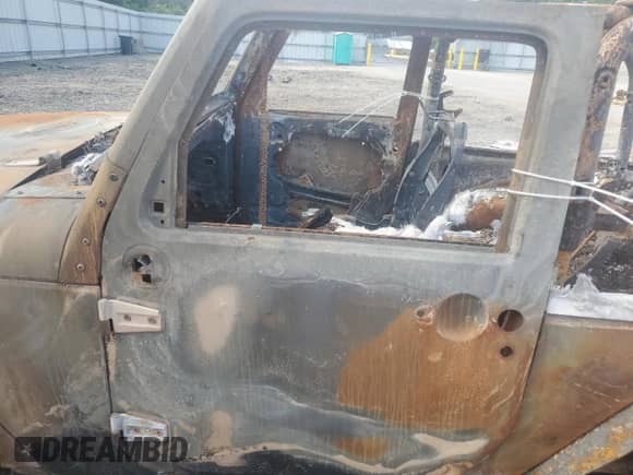 2014 Jeep Wrangler Sahara z VIN 1C4AJWBG6EL168763, wystawiony jako Copart lot #65880875 z przebiegiem Nie podano mil oraz Szkoda całkowita • Salvage title. Historia ofert i sprzedaży dostępna na DreamBid. Obrazek 7.