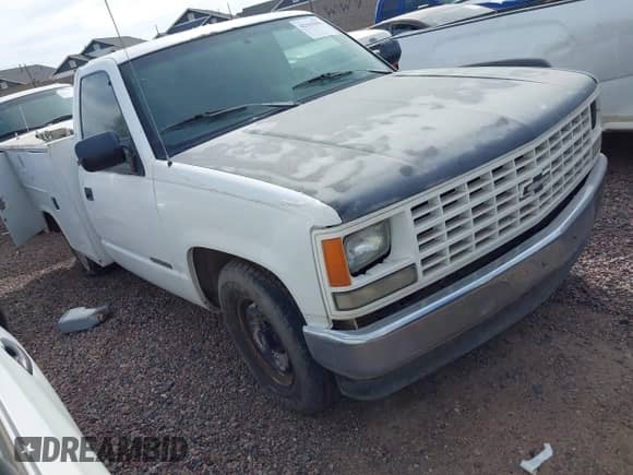 1993 Chevrolet Silverado 2500 z VIN 1GCFC24K6PE121279, wystawiony jako IAAI lot #42165098 z przebiegiem 326 526 mil mil oraz . Historia ofert i sprzedaży dostępna na DreamBid. Obrazek 1.