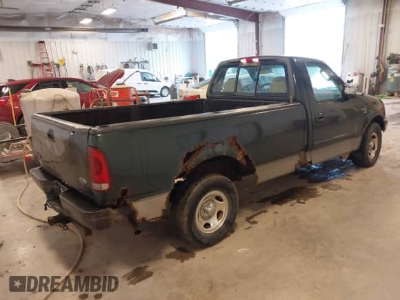 2002 Ford F-150 XL с VIN 2FTRF17W42CA68335, выставлен на аукционе IAAI как лот 42307601 с пробегом 184 138 миль миль и . История ставок и продаж доступна на DreamBid. Изображение 4.