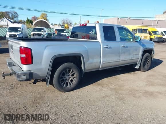 2014 GMC Sierra 1500 SLE with VIN 1GTV2UEC1EZ277382, listed as a IAAI auction lot 43487639 with 152,609 mi miles and . Bid and sale history available at DreamBid. Image 4.
