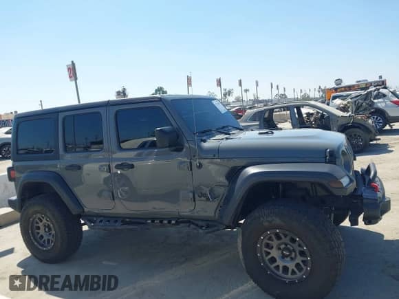 2022 Jeep Wrangler Unlimited Sport S with VIN 1C4HJXDG7NW144553, listed as a IAAI auction lot 43219987 with 25,211 mi miles and . Bid and sale history available at DreamBid. Image 13.