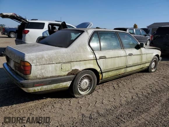 1993 BMW 7 Series with VIN WBAGD832XPDE85801, listed as a Copart auction lot 77111624 with 163,143 mi miles and Clean title. Bid and sale history available at DreamBid. Image 3.