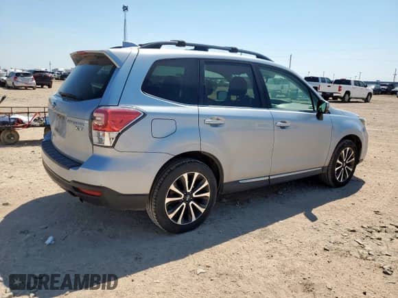2017 Subaru Forester Touring z VIN JF2SJGWC6HH498784, wystawiony jako Copart lot #71694785 z przebiegiem 65 980 mil mil oraz Czysty tytuł • Clean title. Historia ofert i sprzedaży dostępna na DreamBid. Obrazek 3.