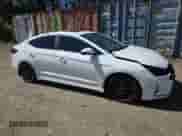 2020 Hyundai Elantra Sport z VIN KMHD04LBXLU070409, wystawiony jako Copart lot #69004755 z przebiegiem 160 828 mil mil oraz Szkoda całkowita • Salvage title. Historia ofert i sprzedaży dostępna na DreamBid. Obrazek 4.