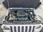 2023 Jeep Wrangler Sport S with VIN 1C4HJXDN3PW682572, listed as a Copart auction lot 68643135 with 14,621 mi miles and Salvage title. Bid and sale history available at DreamBid. Image 12.