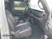 2022 Jeep Wrangler Unlimited Sahara with VIN 1C4HJXEG1NW257025, listed as a IAAI auction lot 41514099 with 40,398 mi miles and . Bid and sale history available at DreamBid. Image 5.