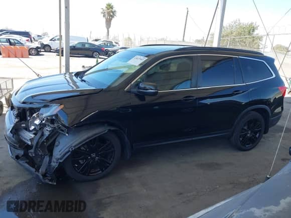 2021 Honda Pilot Special Edition z VIN 5FNYF5H27MB045707, wystawiony jako IAAI lot #43023503 z przebiegiem 70 400 mil mil oraz . Historia ofert i sprzedaży dostępna na DreamBid. Obrazek 14.