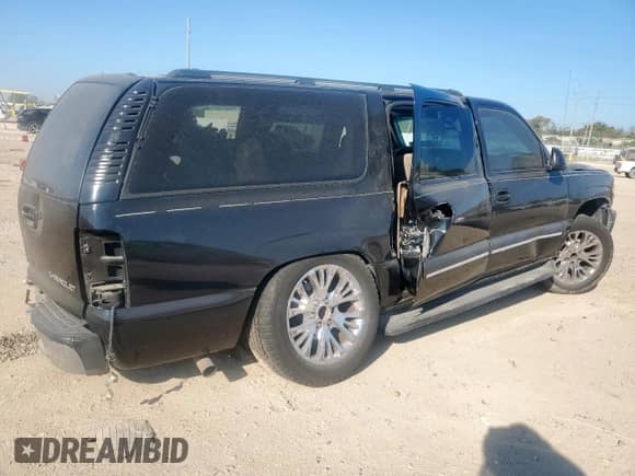 2003 Chevrolet Suburban LS z VIN 3GNEC16Z33G340355, wystawiony jako Copart lot #82348705 z przebiegiem 173 686 mil mil oraz Szkoda całkowita • Salvage title. Historia ofert i sprzedaży dostępna na DreamBid. Obrazek 3.