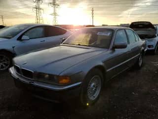 1998 BMW 7 Series 740i with VIN WBAGF8322WDL54061, listed as a Copart auction lot 44201255 with 213,297 mi miles and Clean title. Bid and sale history available at DreamBid. Image 1.