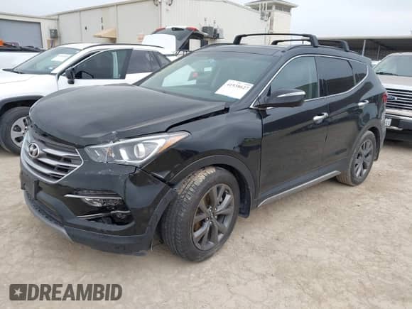 2018 Hyundai Santa Fe Ultimate с VIN 5NMZW4LA8JH085771, выставлен на аукционе IAAI как лот 41938627 с пробегом 137 879 миль миль и . История ставок и продаж доступна на DreamBid. Изображение 2.