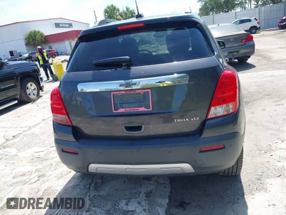 2016 Chevrolet Trax LTZ z VIN 3GNCJMSB1GL179671, wystawiony jako IAAI lot #42715210 z przebiegiem Nie podano mil oraz . Historia ofert i sprzedaży dostępna na DreamBid. Obrazek 15.