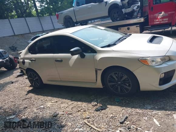 2017 Subaru WRX z VIN JF1VA1B62H9826999, wystawiony jako IAAI lot #42376573 z przebiegiem 79 419 mil mil oraz . Historia ofert i sprzedaży dostępna na DreamBid. Obrazek 13.