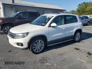 2014 Volkswagen Tiguan SE with VIN WVGBV3AX5EW538720, listed as a Copart auction lot 72013325 with 146,643 mi miles and Clean title. Bid and sale history available at DreamBid. Image 1.