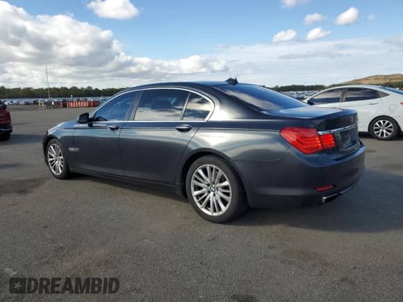 2011 BMW 7 Series 740Li with VIN WBAKB4C52BC392785, listed as a Copart auction lot 86619215 with 211,977 mi miles and Clean title. Bid and sale history available at DreamBid. Image 2.
