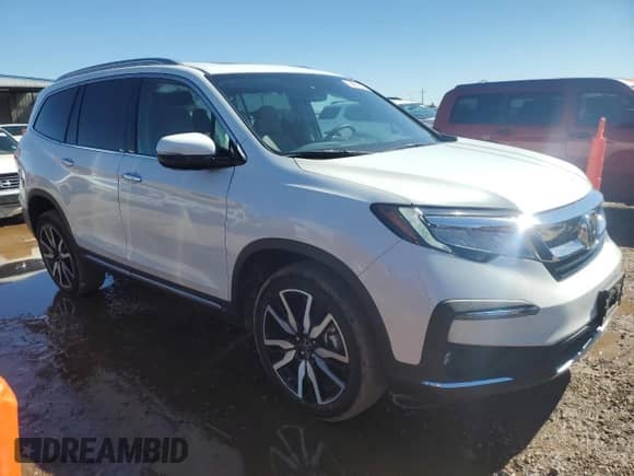 2022 Honda Pilot Elite z VIN 5FNYF6H04NB066147, wystawiony jako Copart lot #84051365 z przebiegiem 26 894 mil mil oraz Szkoda całkowita • Salvage title. Historia ofert i sprzedaży dostępna na DreamBid. Obrazek 4.