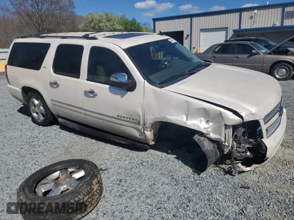 2012 Chevrolet Suburban LTZ с VIN 1GNSCKE04CR327982, выставлен на аукционе Copart как лот 49387775 с пробегом 201 456 миль миль и Списание • Salvage title. История ставок и продаж доступна на DreamBid. Изображение 4.