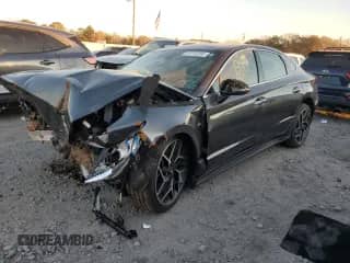 2022 Hyundai Sonata N Line с VIN KMHL14JC1NA234185, выставлен на аукционе Copart как лот 85276284 с пробегом Не указан миль и Списание • Salvage title. История ставок и продаж доступна на DreamBid. Изображение 1.